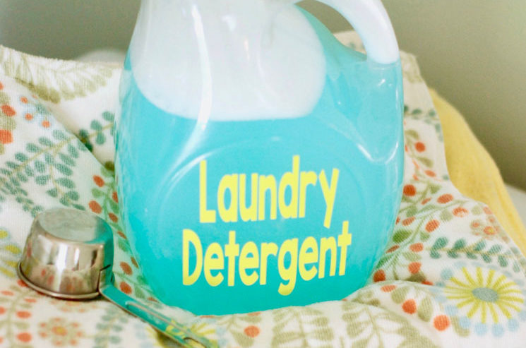 large plastic juice bottle repurposed as a container for homemade laundry detergenet
