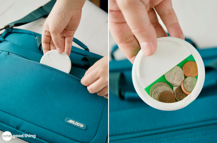 a mint container holding loose change 
