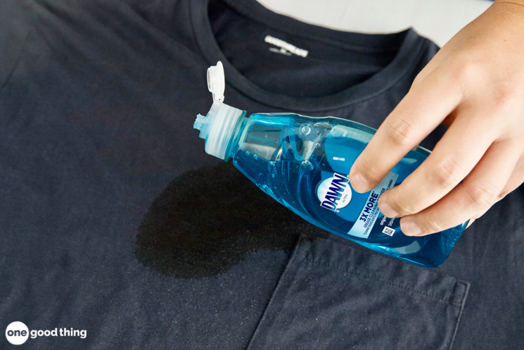 How to get oil stains out of clothing. After spraying the oil stain with hydrogen peroxide, put a couple of drops of Dawn and some baking soda on the stain.