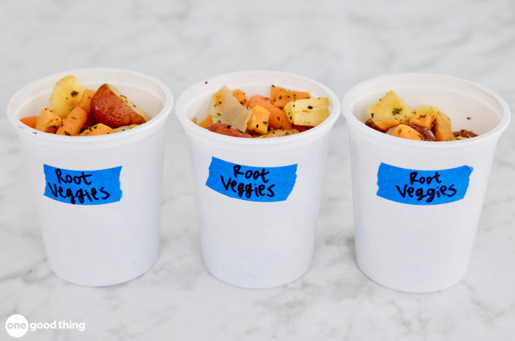 recycled large yogurt containers holding leftovers of root veggies 